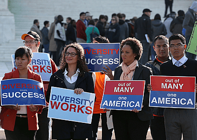 Protesters with signs in from of Supreme Court.