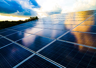 Solar panels lined up on a roof.