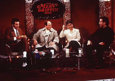 Actor Michael Richards as Cosmo Kramer, Jason Alexander as George Costanza, Julia Louis-Dreyfus as Elaine Benes, and Jerry Seinfeld as himself on the 1997 'Seinfeld' episode 'The Merv Griffin Show.'