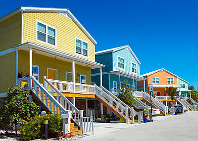 A yellow, blue, and orange beach house in Key West, Florida.