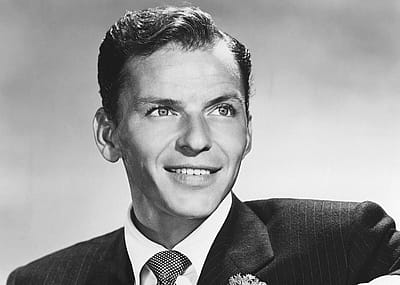 Frank Sinatra poses for a portrait in 1958.