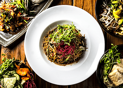 A selection of five vegan dishes on a table.