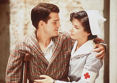 Actors Chris O'Donnell and Sandra Bullock in the movie 'In Love and War.'