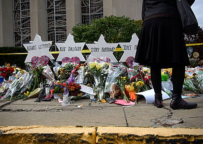 Mourners visit the memorial outside the Tree of Life Synagogue on Oct. 31, 2018 in Pittsburgh, Pennsylvania.