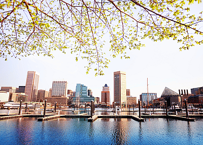 Baltimore skyline with water in the foreground.