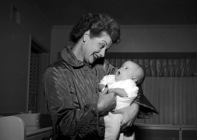 Lucille Ball at home with her son Desi Arnaz Jr., 1953.