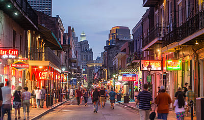Pubs and bars with neon lights in the French Quarter, downtown New Orleans.