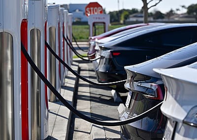 Drivers charge their Teslas in Fountain Valley, California.