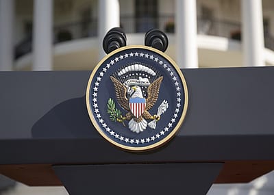 The U.S. seal on a podium.