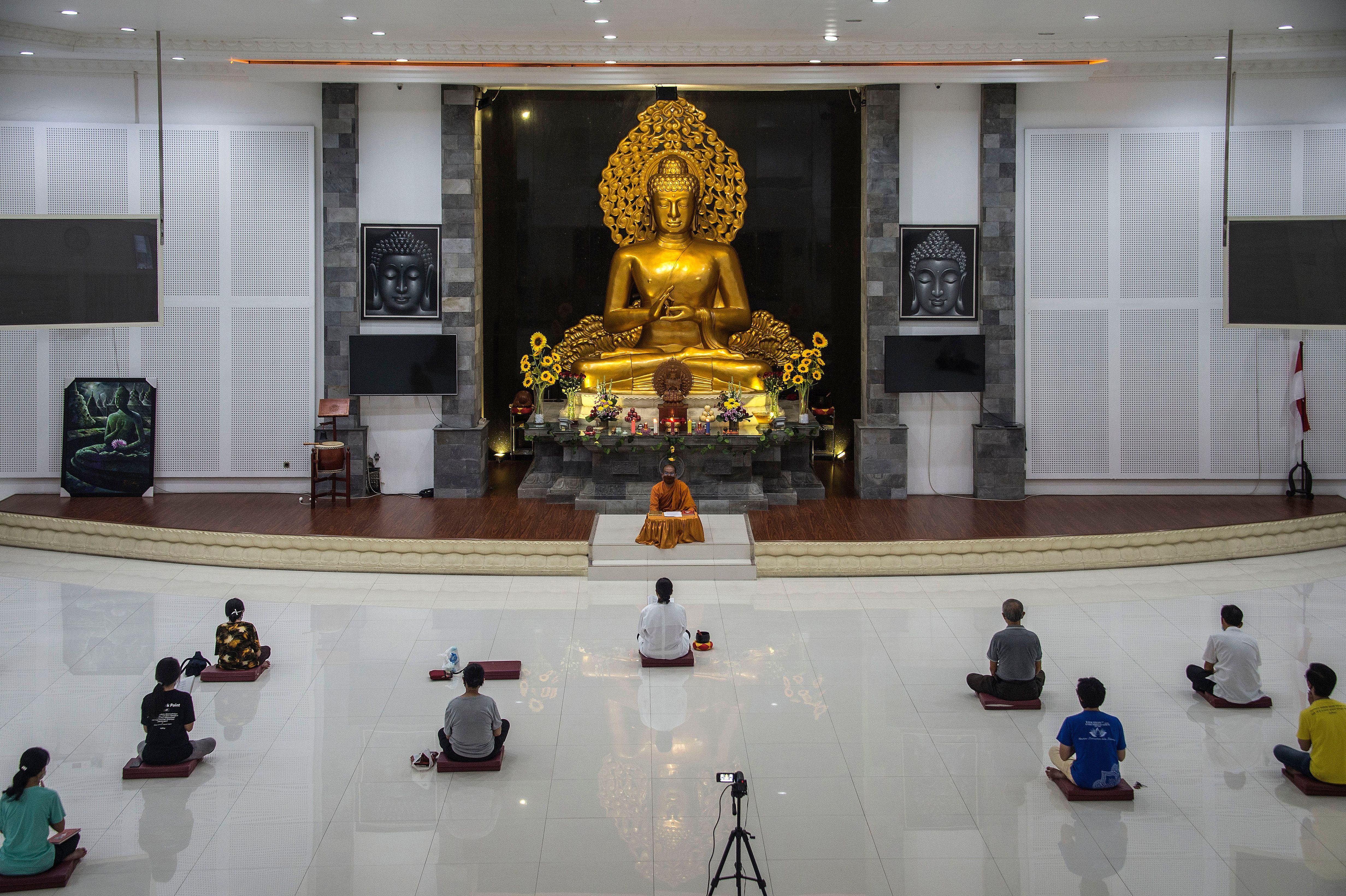 Social distancing in a temple in Indonesia