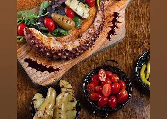 #14. La Taberna Steak & Tapas Bar