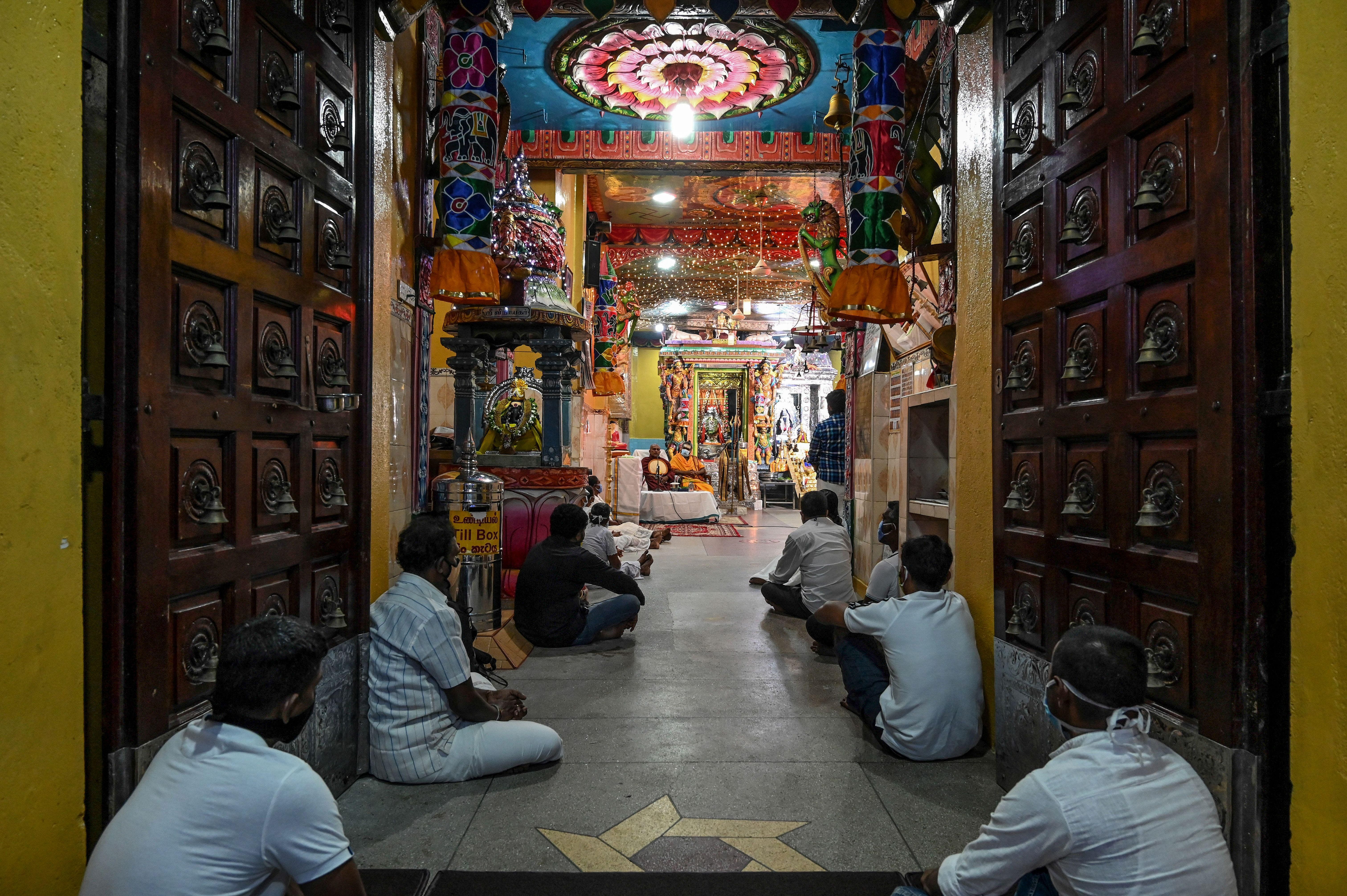 Buddhists and Hindus pray together in Sri Lanka