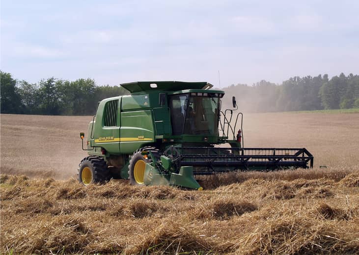 Combine working in a field