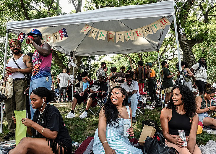 People participate in a Juneteenth celebration in Fort Greene park.