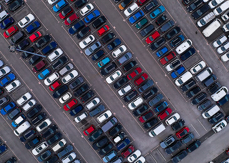 Aerial view of cars lined up for export.
