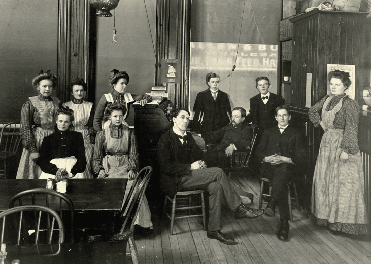 Waiters and waitresses pose for a group picture