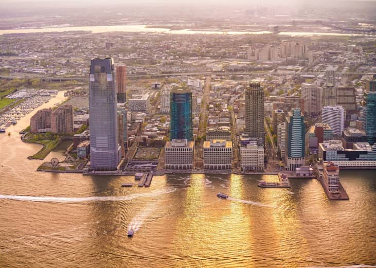 Aerial view of Jersey CIty at sunset.