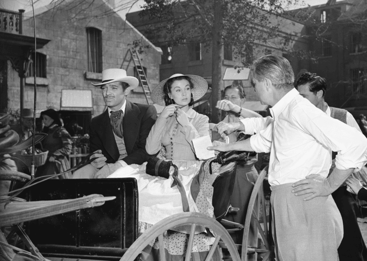 Victor Fleming, Vivien Leigh, and Clark Gable on the set of ‘Gone with the Wind’.