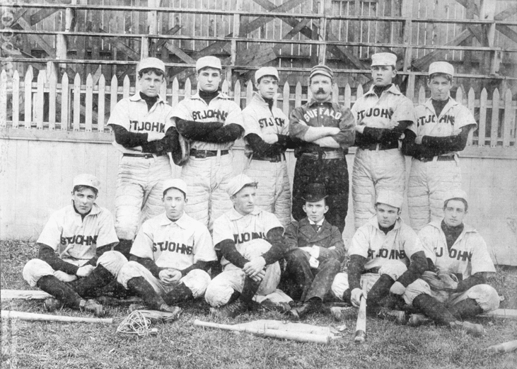 Members of the St John baseball team pose on a field, circa 1895