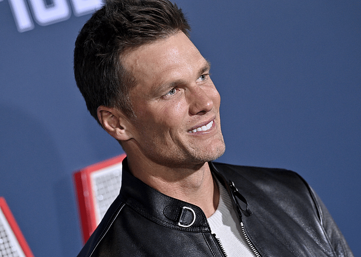 Tom Brady attends a film premiere.