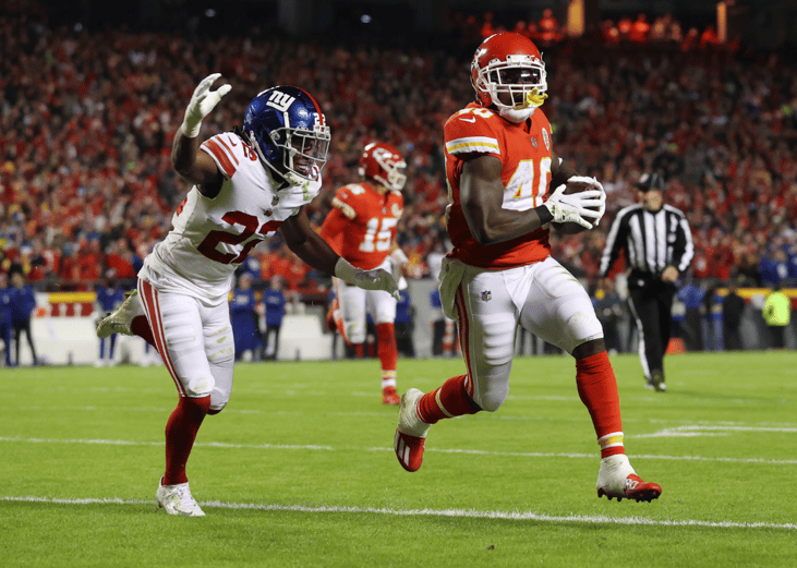 Derrick Gore #40 of the Kansas City Chiefs runs into the end zone for a touchdown as Adoree' Jackson #22 of the New York Giants defends during the first half at Arrowhead Stadium on November 01, 2021 in Kansas City, Missouri. 
