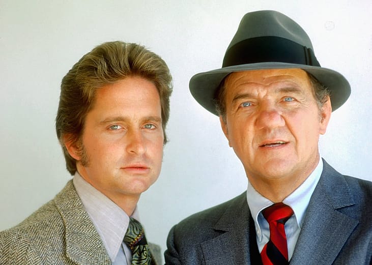Actors Karl Malden and Michael Douglas pose for a portrait on the set of 'The Streets of San Francisco' in August 1974 in San Francisco, California.