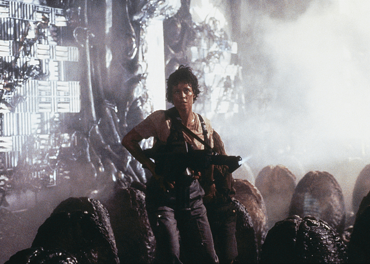 American actor Sigourney Weaver on the set of the film Aliens, directed by James Cameron.