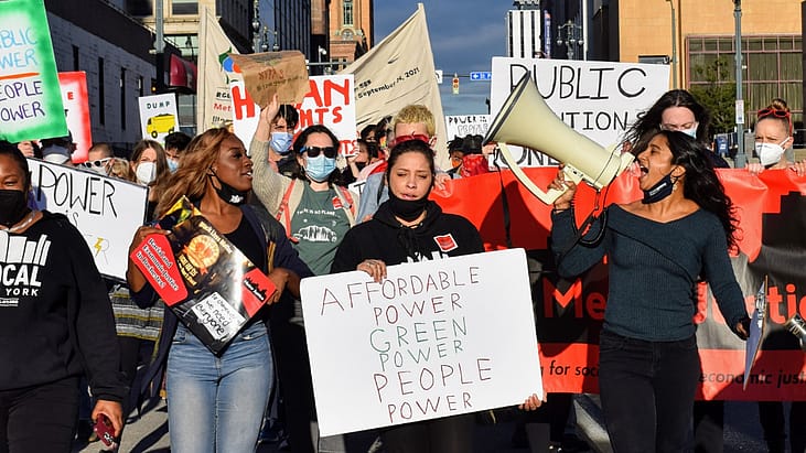 Metro Justice members, a grassroots organization advocating for public power in Rochester, New York