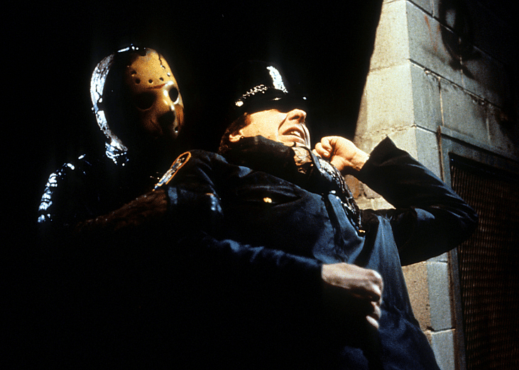 Jason grabs cop in a scene from the film 'Friday The 13th Part VIII: Jason Takes Manhattan', 1989.