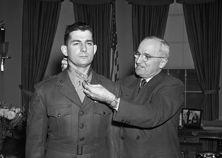 President Truman presents the Medal of Honor to Marine Sgt. Archie Van Winkle of Everett, Washington.
