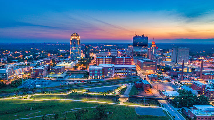 View of Winston-Salem North Carolina skyline at dusk. 