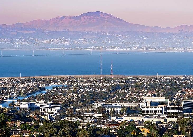 An aerial view of San Carlos and Redwood City with Mount Diablo in the background.