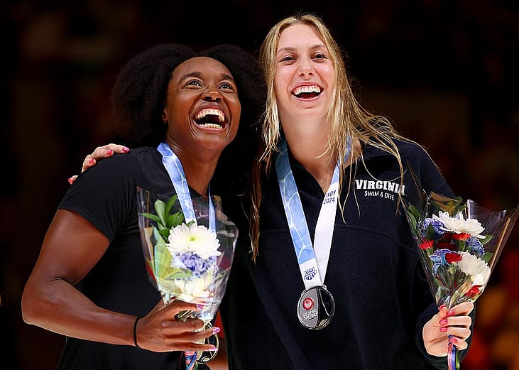 Simone Manuel and Gretchen Walsh react during the medal ceremony for the Women's 50m freestyle final at the 2024 U.S. Olympic Team Swimming Trials.