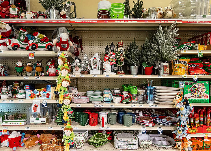 Christmas items such as decorations, toys and chocolates for sale at a local market.