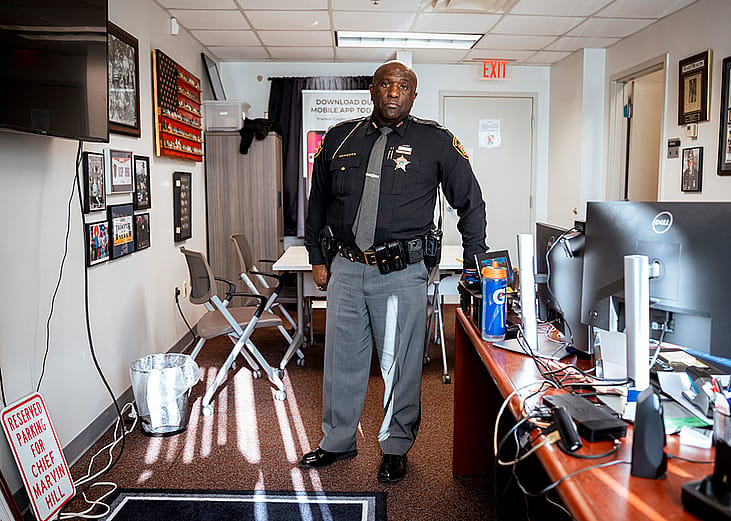 Chief Deputy Marvin Hill poses for a portrait in his office in Columbus, Ohio.