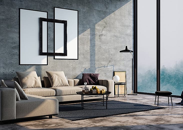 Modern interior design of a home's living room with concrete walls.