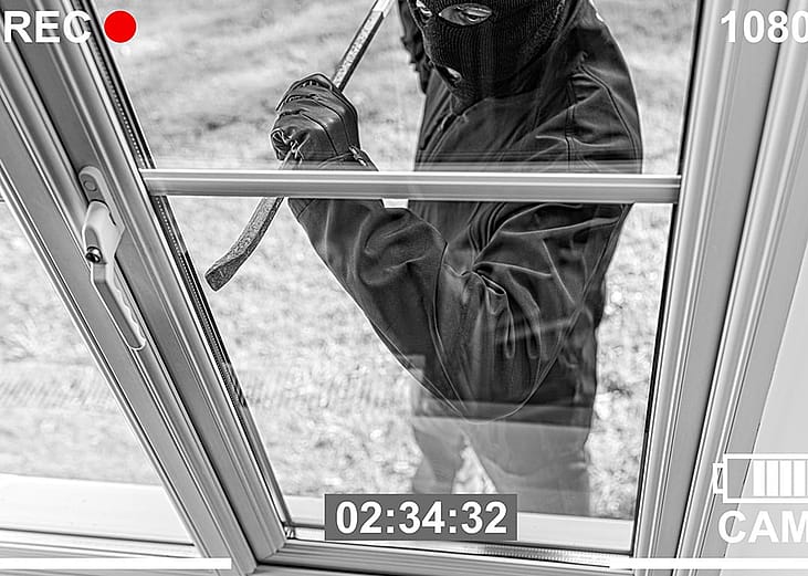 CC TV footage of a business break-in happening.