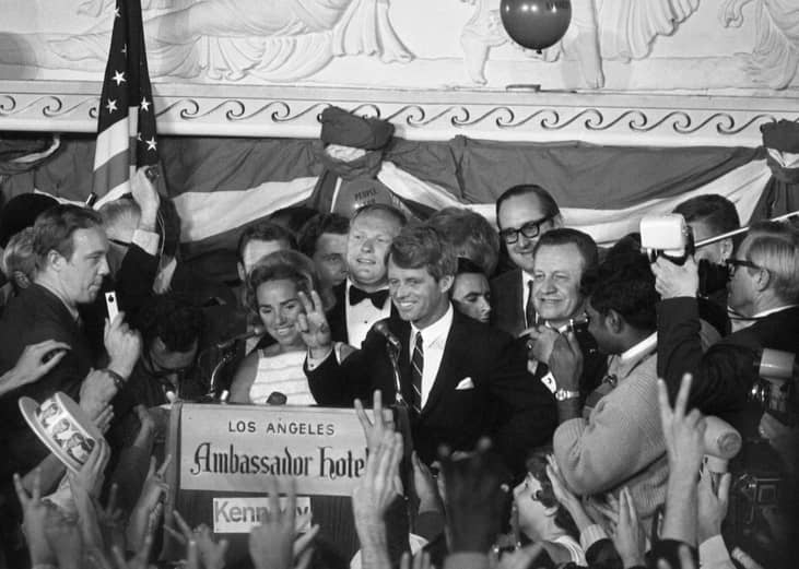 Sen. Robert Francis Kennedy gives victory sign to huge crowd at the Ambassador Hotel on June 5, 1968.