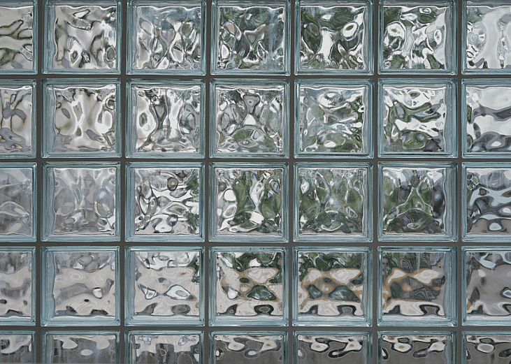 A wall of glass blocks that distorts and blurs what is on the other side.