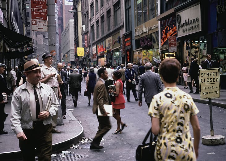 Pedestrians in Downtown Manhattan in New York City, New York, circa 1975.