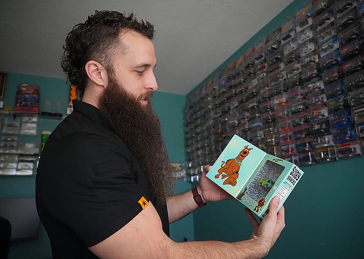 Ian Weber, a Hot Wheels collector of 18 years, talks about a Scooby-Doo Hot Wheels van in his collection at his home in Lehi.