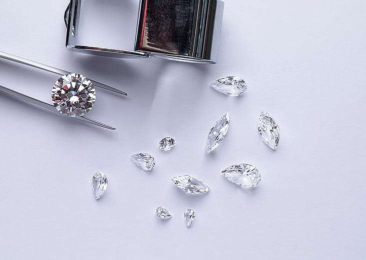 Different cuts of polished diamonds.