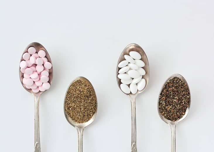 Spoonfuls of supplements such as chamomile, magnesium pills, vitamin B complex pills and lemon balm.