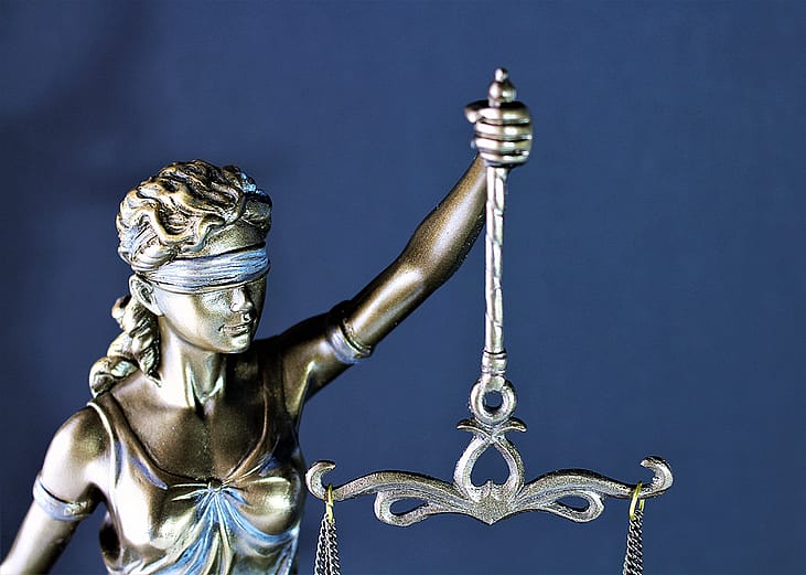 A figure of Justitia or Lady Justice.