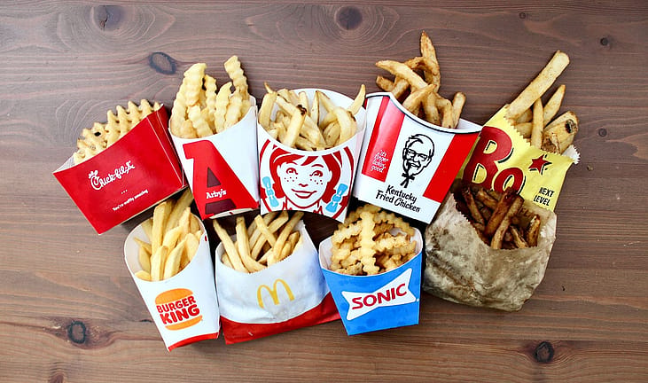 Overhead shot of french fries from 9 different fast food restaurants