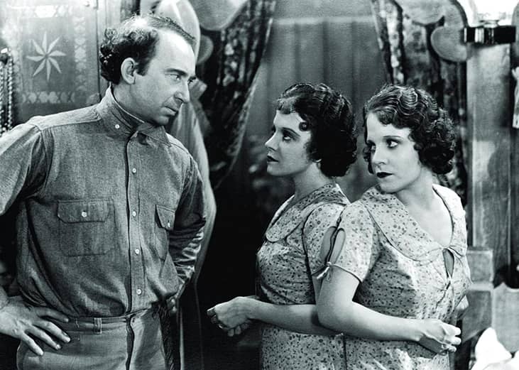 Roscoe Ates, Daisy Hilton, and Violet Hilton in "Freaks".