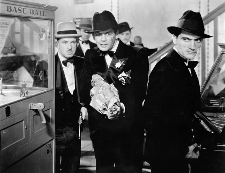 Vince Barnett, Paul Muni, and Tony Camonte in "Scarface".