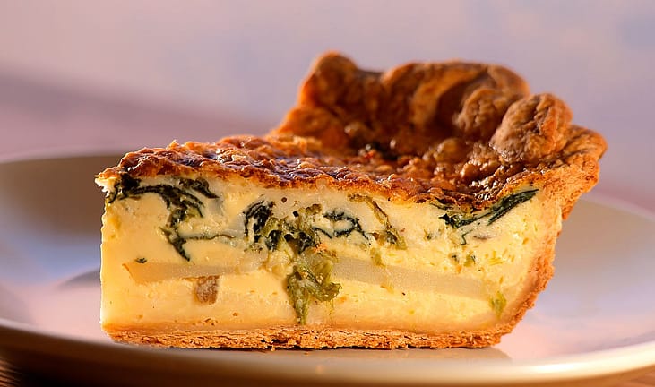 A close shot of a spinach quiche