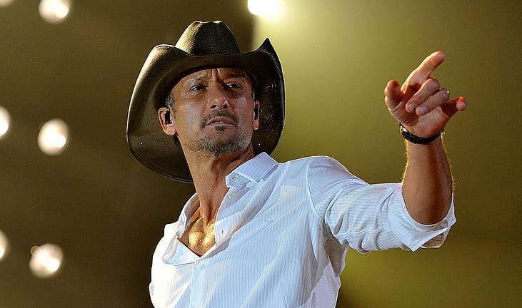 Tim McGraw performs during Keith Urban's Fourth annual We're All For The Hall benefit concert at Bridgestone Arena on April 16, 2013 in Nashville, Tennessee.