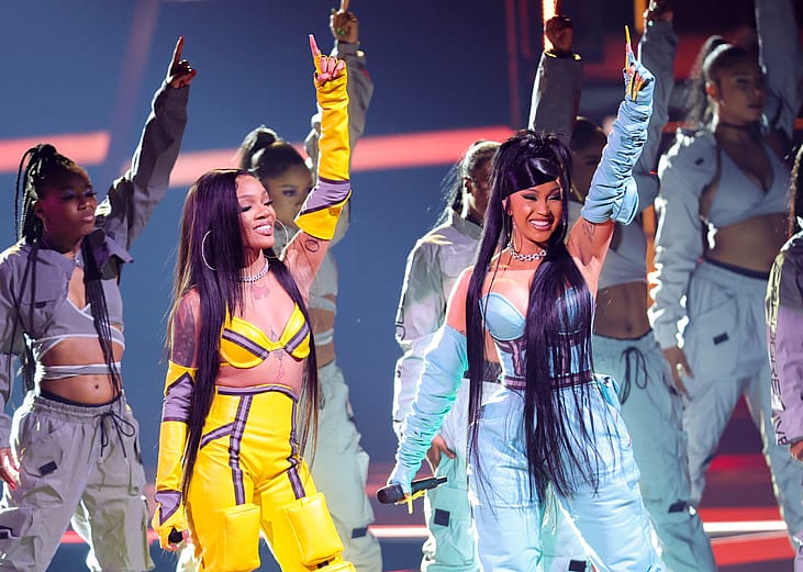 GloRilla and Cardi B perform onstage at the 2022 American Music Awards.